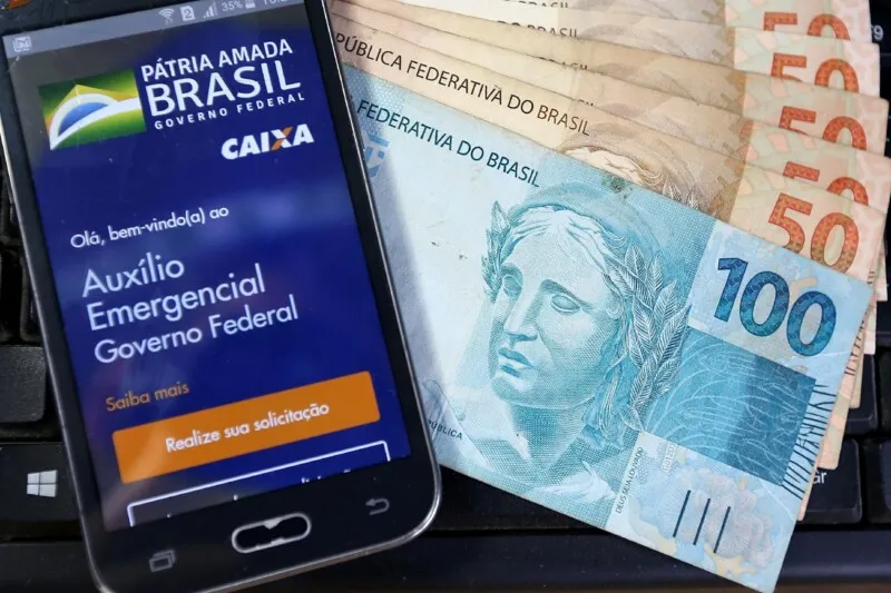 Imagem ilustrativa da imagem Caixa realiza pagamento de auxílio emergencial a inscritos no Bolsa Família com NIS final 0