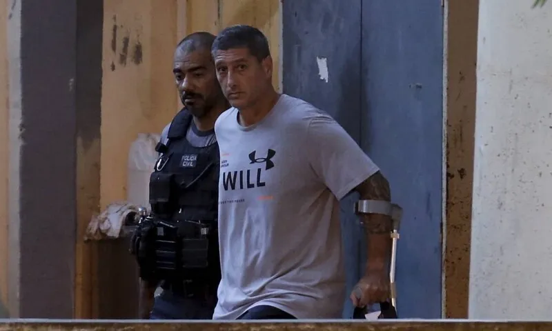 Ronnie Lessa sendo preso por envolvimento no assassinato da vereadora Marielle Franco.