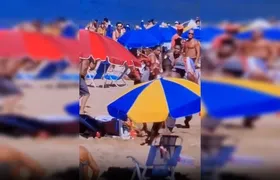 Briga generalizada entre barraqueiros e lutador profissional é registrada na Praia da Urca