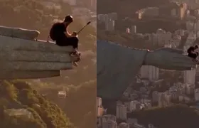 Dupla invade estátua e pula de paraquedas 'da mão do Cristo Redentor'