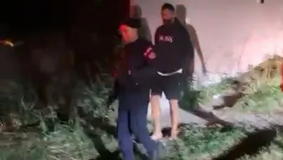 Imagens registradas na hora da prisão revelam Bruno sendo conduzido pelos policiais à unidade policial
