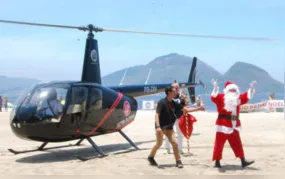 Natal em Niterói: Papai Noel chega de helicóptero à Praia de Icaraí neste domingo (14)