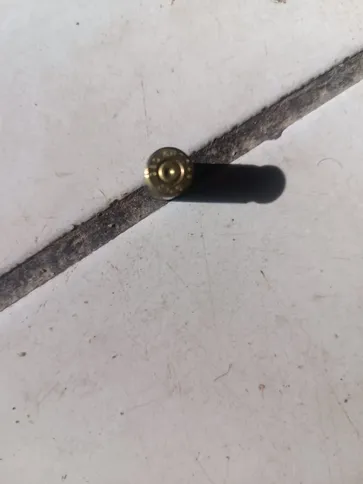 Projétil encontrado no local