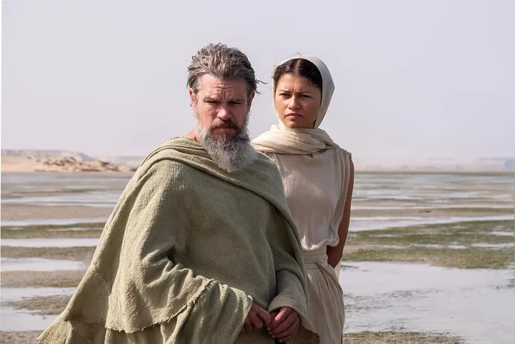 Matt Damon, como Odisseu e Zendaya, como Atena