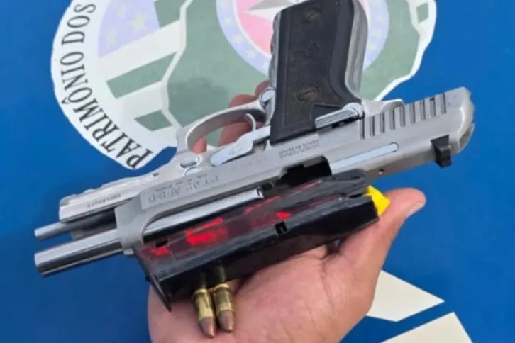 Pistola calibre 9 mm apreendida com mulher