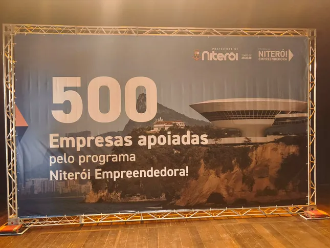 Banner do evento do Niterói Empreendedora celebrando a marca de 500 empresas apoiadas