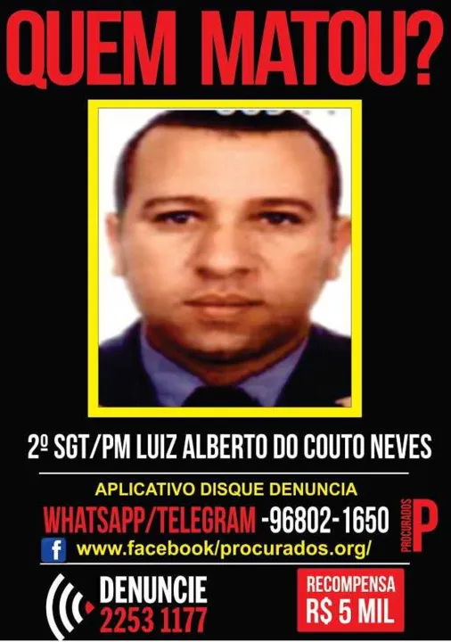 O cartaz tem a foto do sargento Luiz Alberto, um dos mortos na chacina de domingo